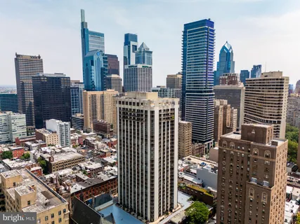 a view of a city with tall buildings