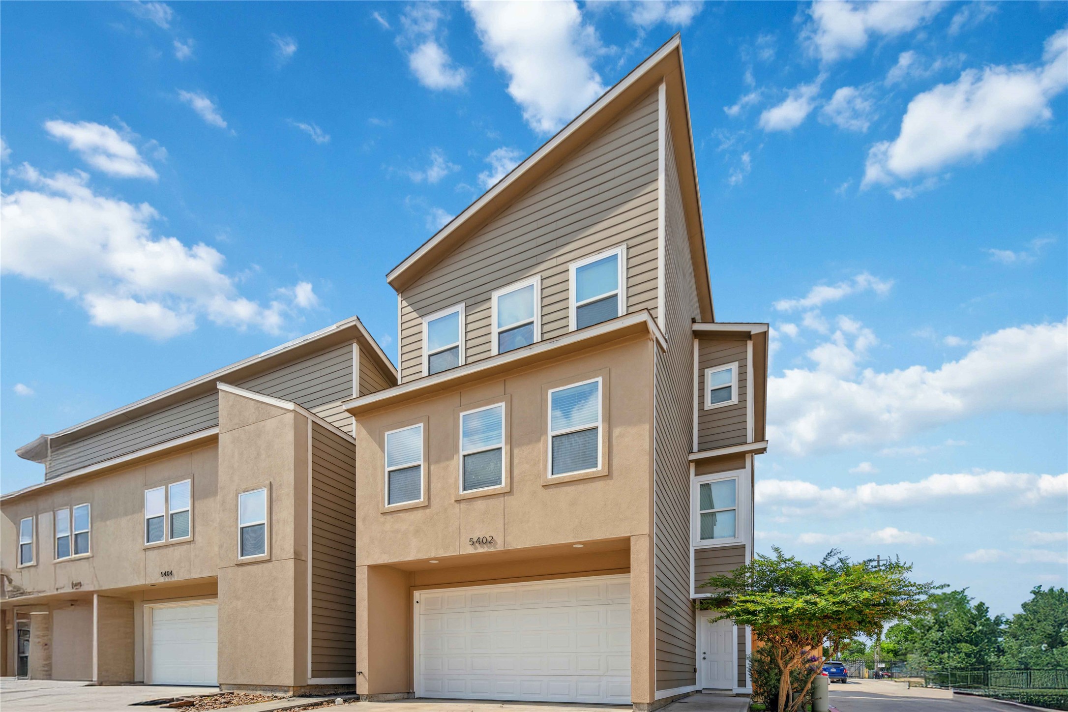 5402 Jonathan Lane Houston, TX 77011 - Photo 1 of 19 a front view of a house with plants