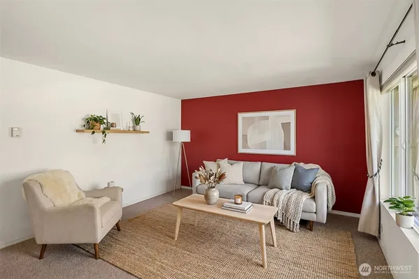 a living room with furniture and window