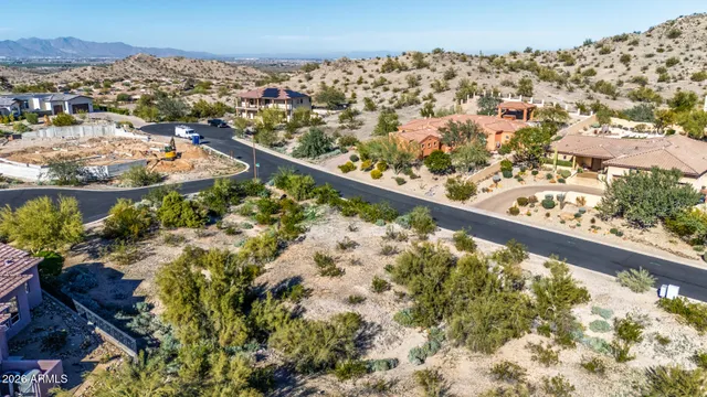 a view of a street with a building in the background