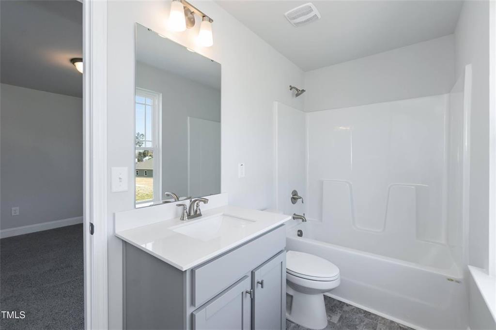 654 Bald Ridge Circle Demorest, GA 30535 - Photo 22 of 22 a bathroom with a sink toilet and a mirror