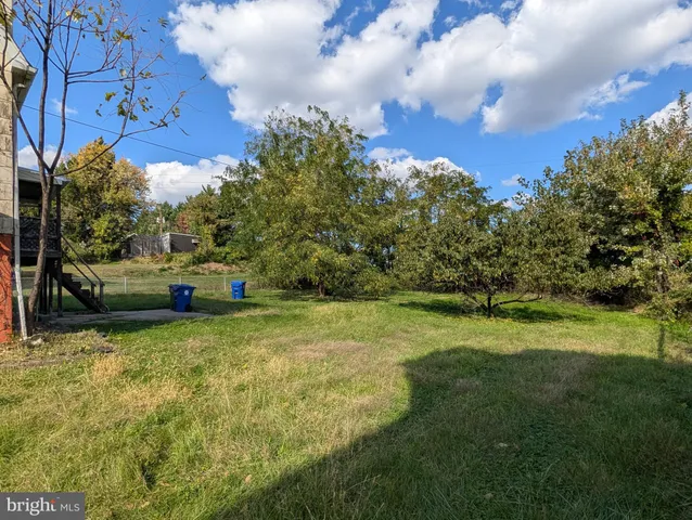 a clock on a wall next to a window
