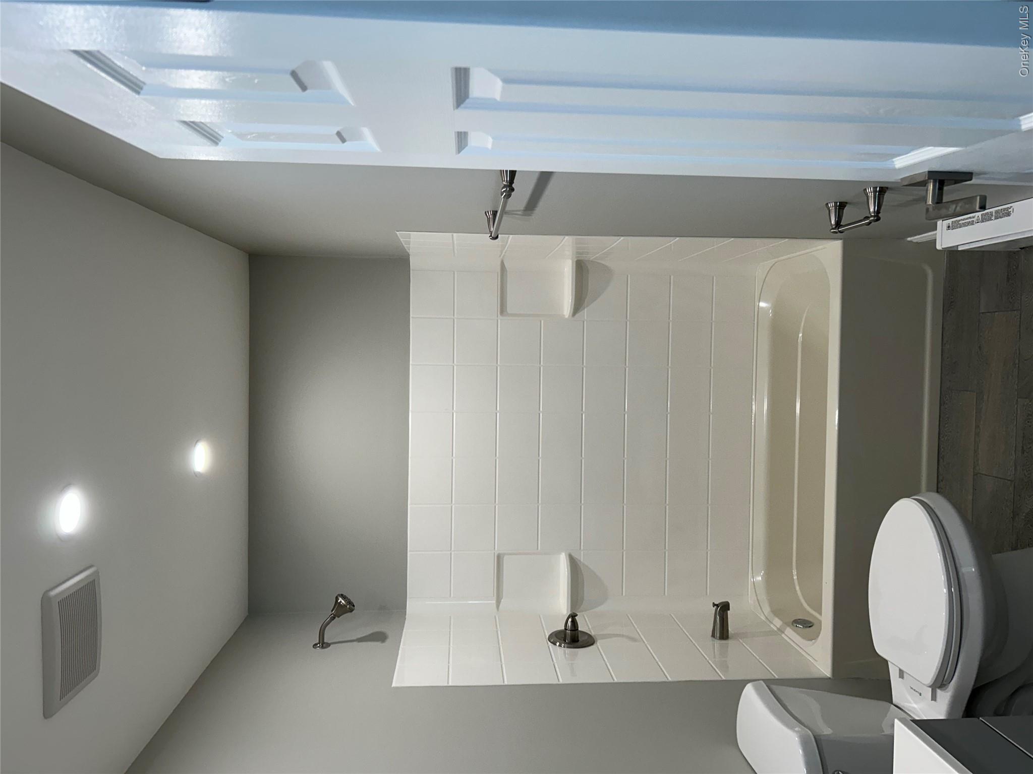 135 Gale Road, Unit UPSTAIRS Mongaup Valley, NY 12762 - Photo 23 of 23 a bathroom with a toilet and a bathtub