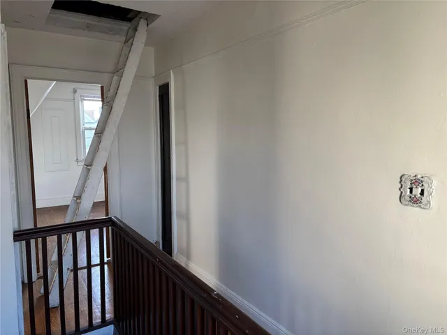 a view of a hallway with entryway