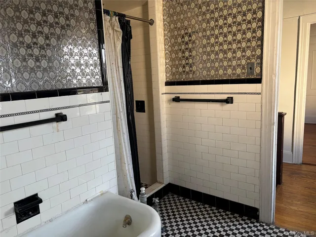 a bathroom with a sink and a shower