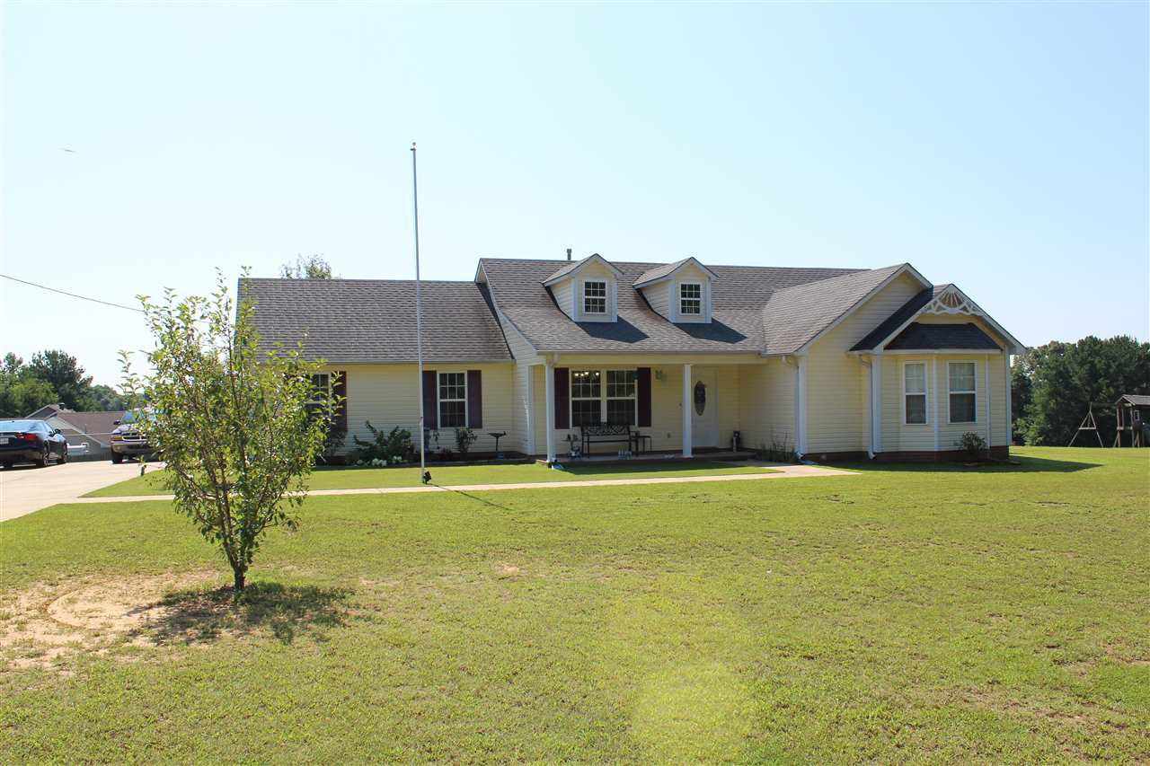 3403 Luray Road Beech Bluff, TN 38313 - Photo 1 of 1 a front view of house with outdoor space and swimming pool