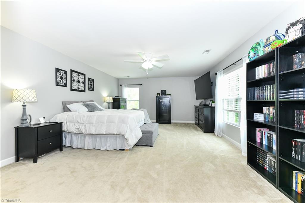 1430 Raspberry Run Graham, NC 27253 - Photo 24 of 35 Primary Bedroom