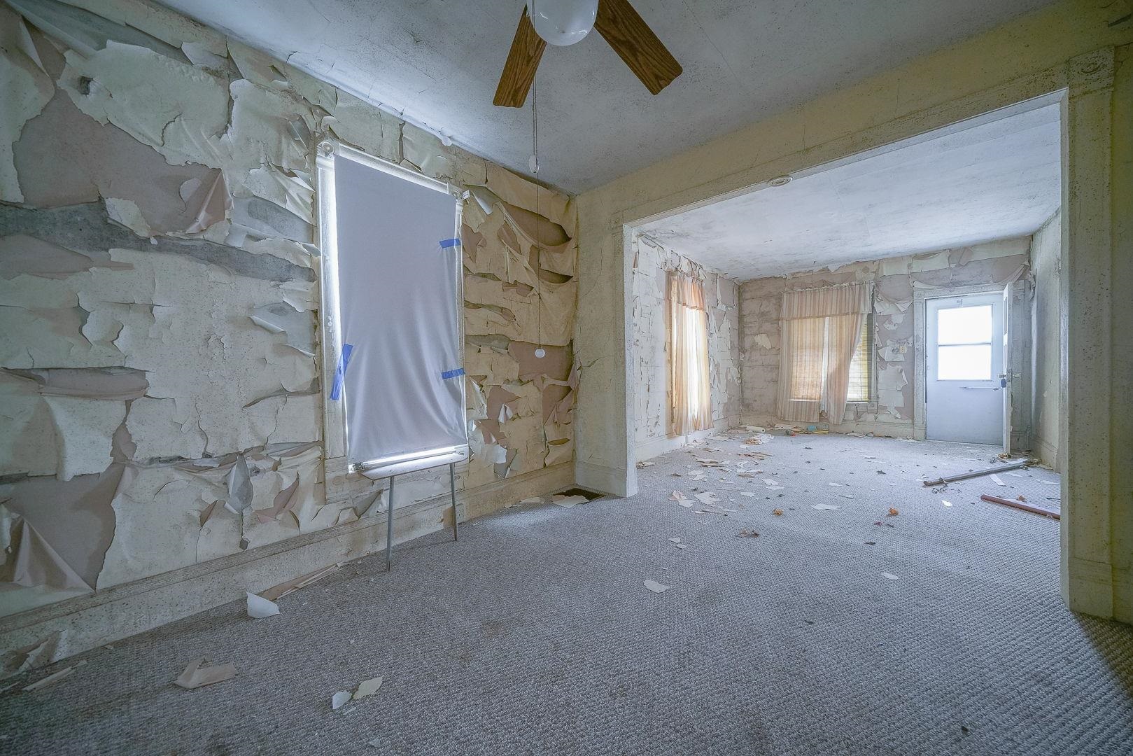 118 North Locust Street Genoa, IL 60135 - Photo 13 of 21 a view of a livingroom with a staircase