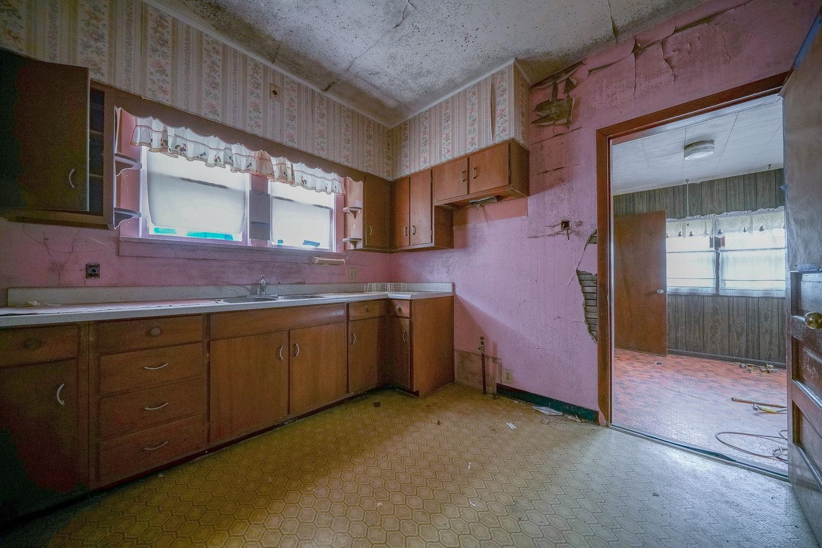118 North Locust Street Genoa, IL 60135 - Photo 5 of 21 a spacious bathroom with a granite countertop sink and a mirror
