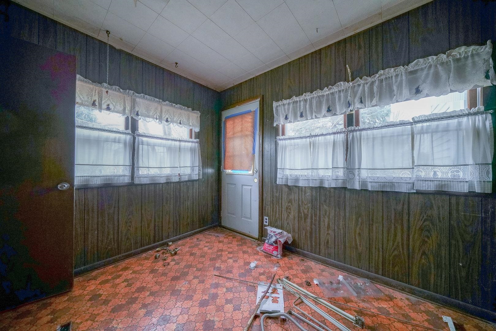 118 North Locust Street Genoa, IL 60135 - Photo 6 of 21 a view of backyard with a small cabin