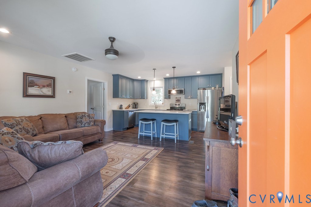 4336 Hells Bend Road Palmyra, VA 22963 - Photo 4 of 35 Open-concept living area featuring wood-finish flo