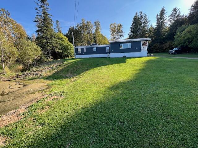 287 South Caribou Road Fort Fairfield, ME 04742 - Photo 2 of 22 North lawn