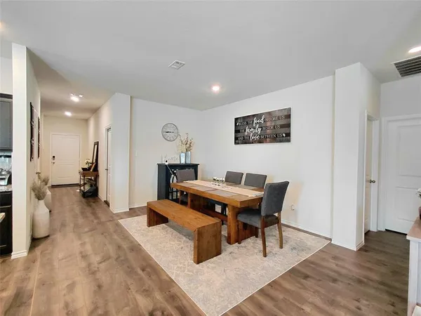 a living room with a table tennis and a table