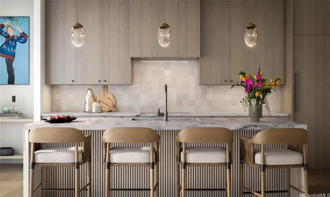 a kitchen with stainless steel appliances granite countertop a sink and cabinets