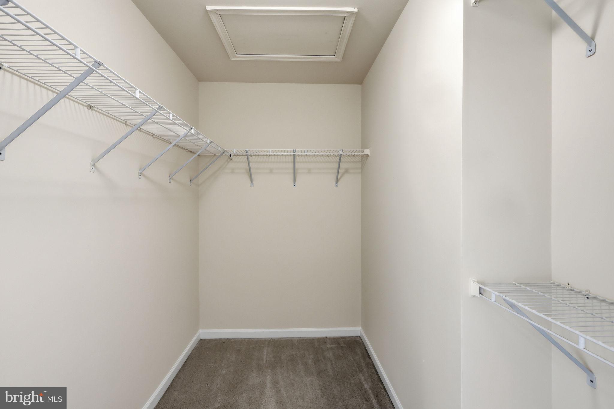 19617 Edgemont Square Ashburn, VA 20147 - Photo 31 of 65 a view of a room with racks on the wall