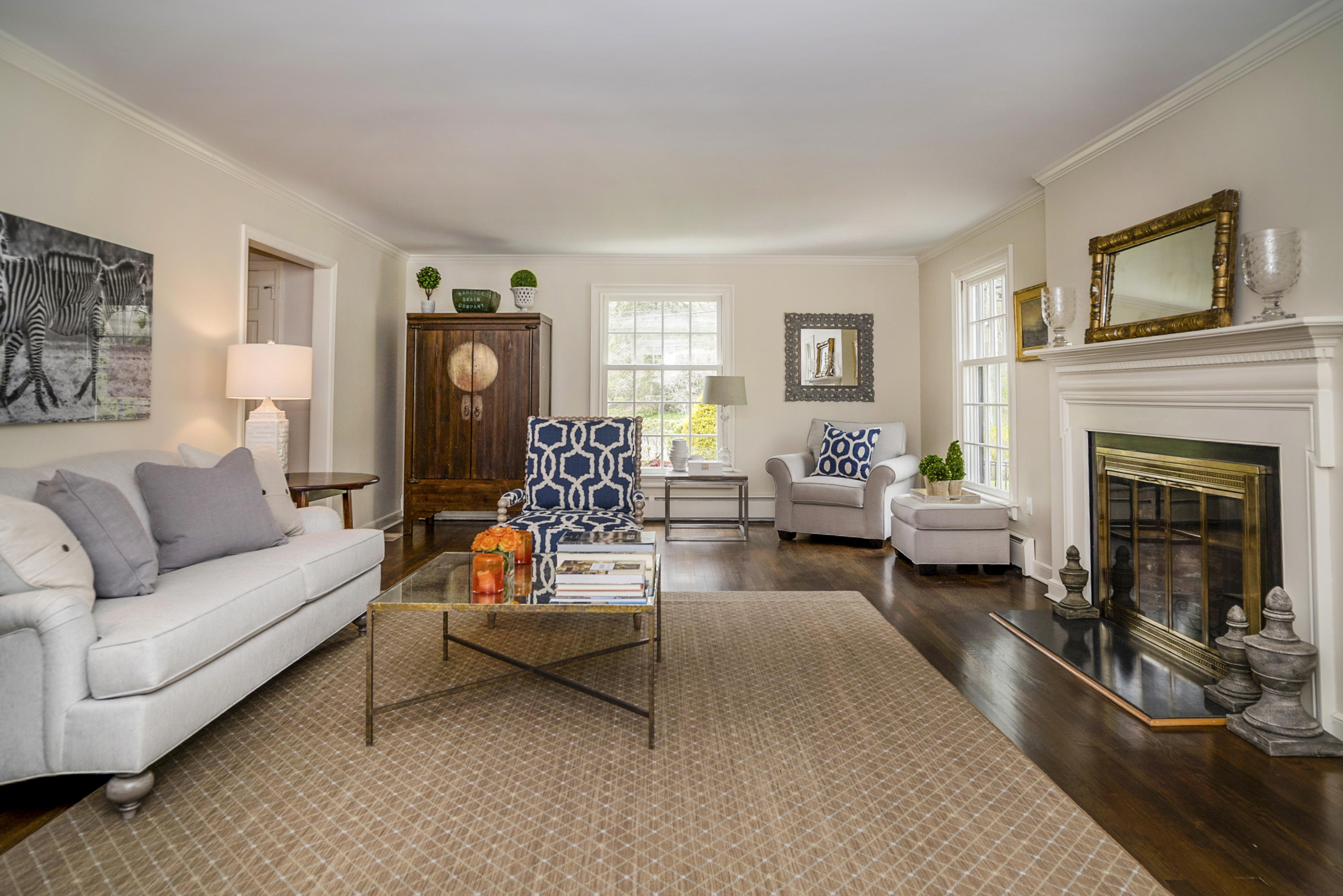 1 Pilgrim Road Darien, CT 06820 - Photo 4 of 26 a living room with furniture and a fireplace