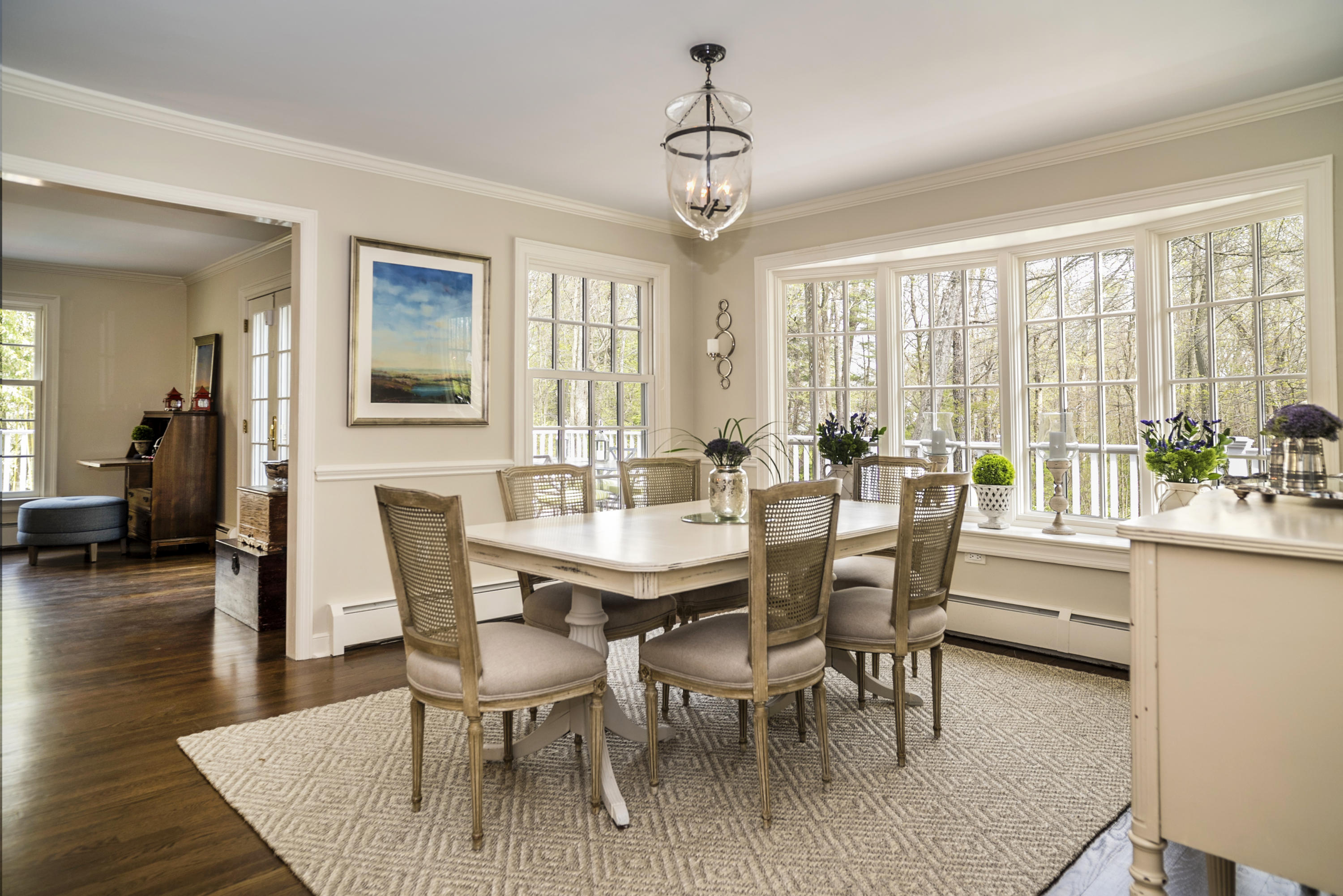 1 Pilgrim Road Darien, CT 06820 - Photo 6 of 26 a view of a dining room with furniture and wooden floor