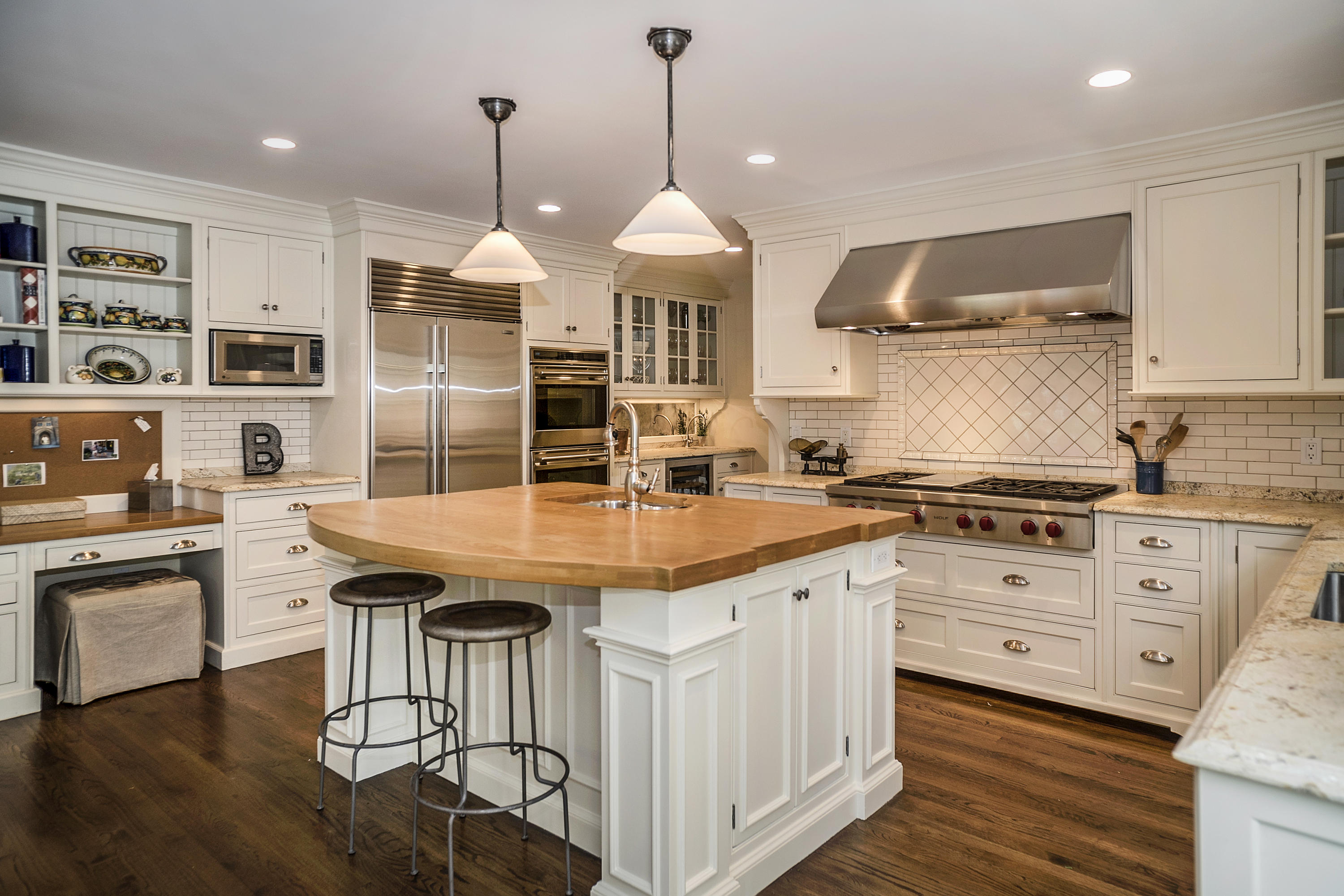 1 Pilgrim Road Darien, CT 06820 - Photo 8 of 26 a kitchen with stainless steel appliances granite countertop a sink a stove and a refrigerator