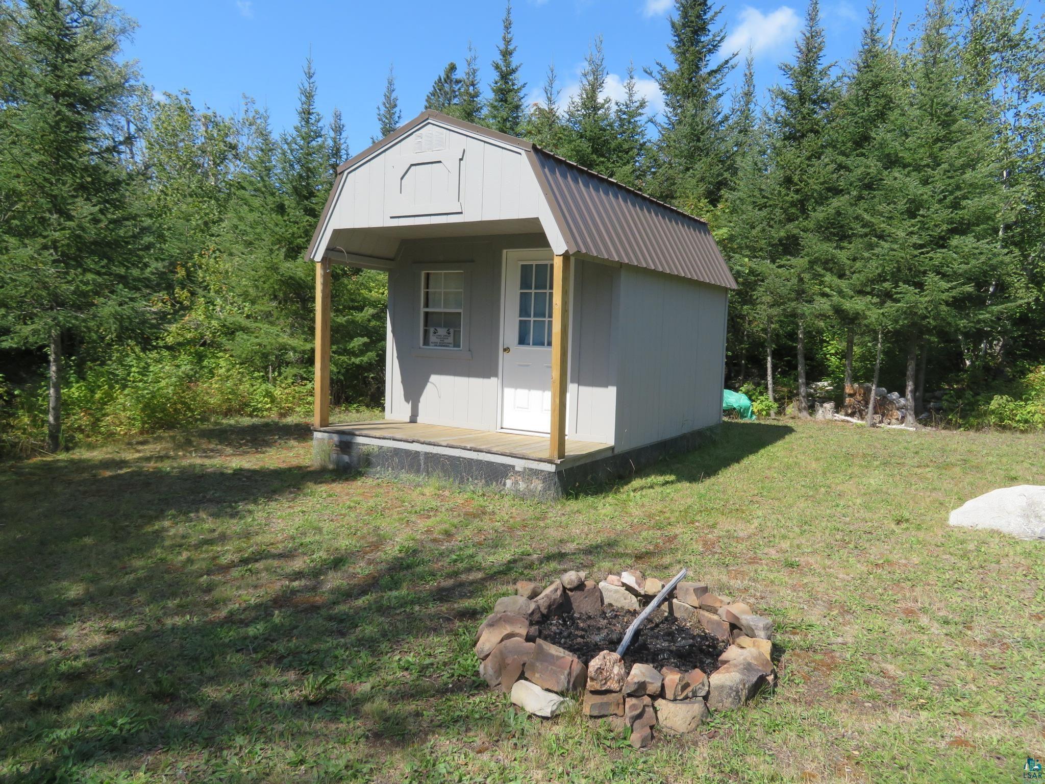 1268 Tom Lake Road Hovland, MN 55606 - Photo 31 of 56 View of outdoor structure with a yard