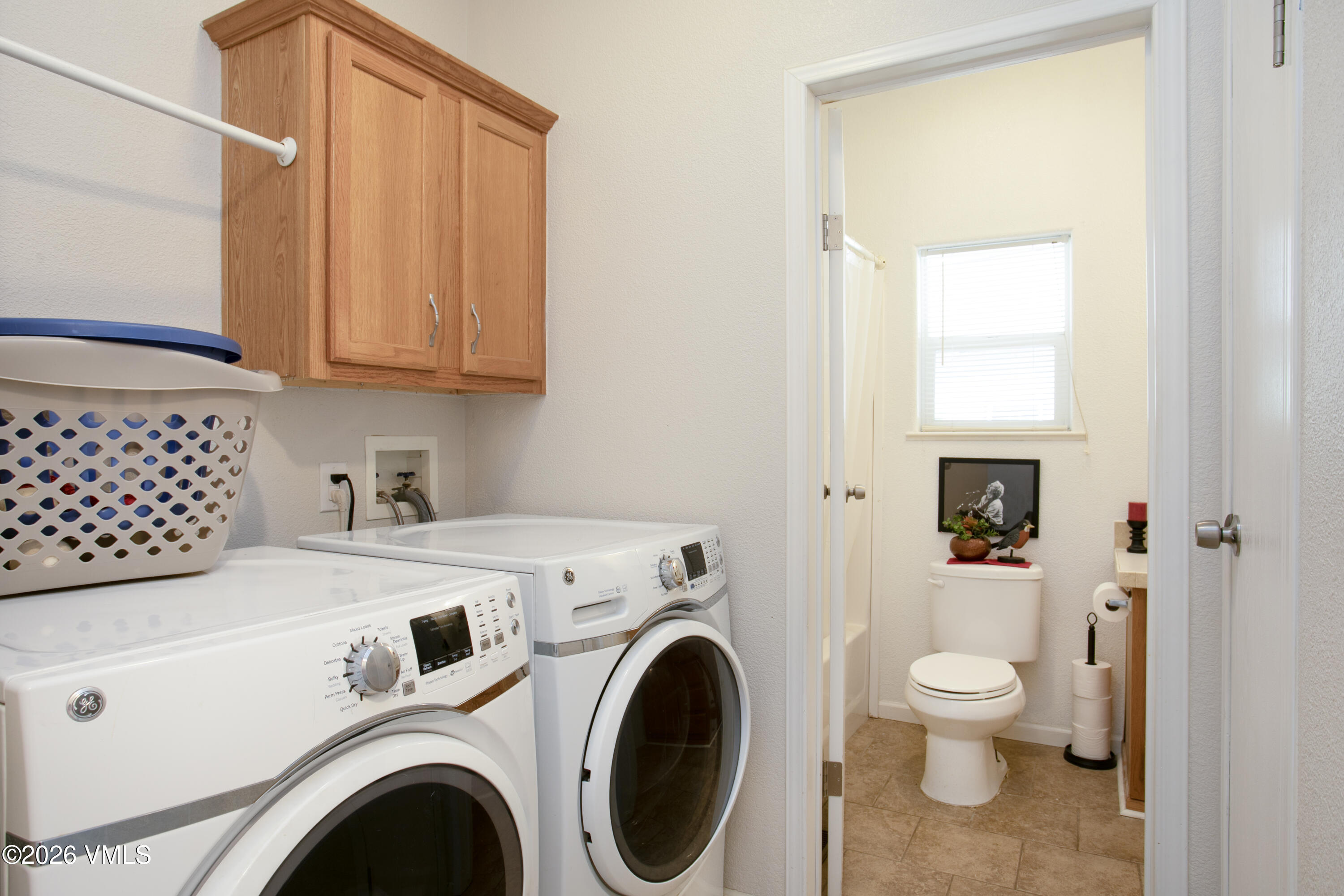 161 Haymaker Loop Gypsum, CO 81637 - Photo 11 of 40 a view of a hallway with washer and dryer
