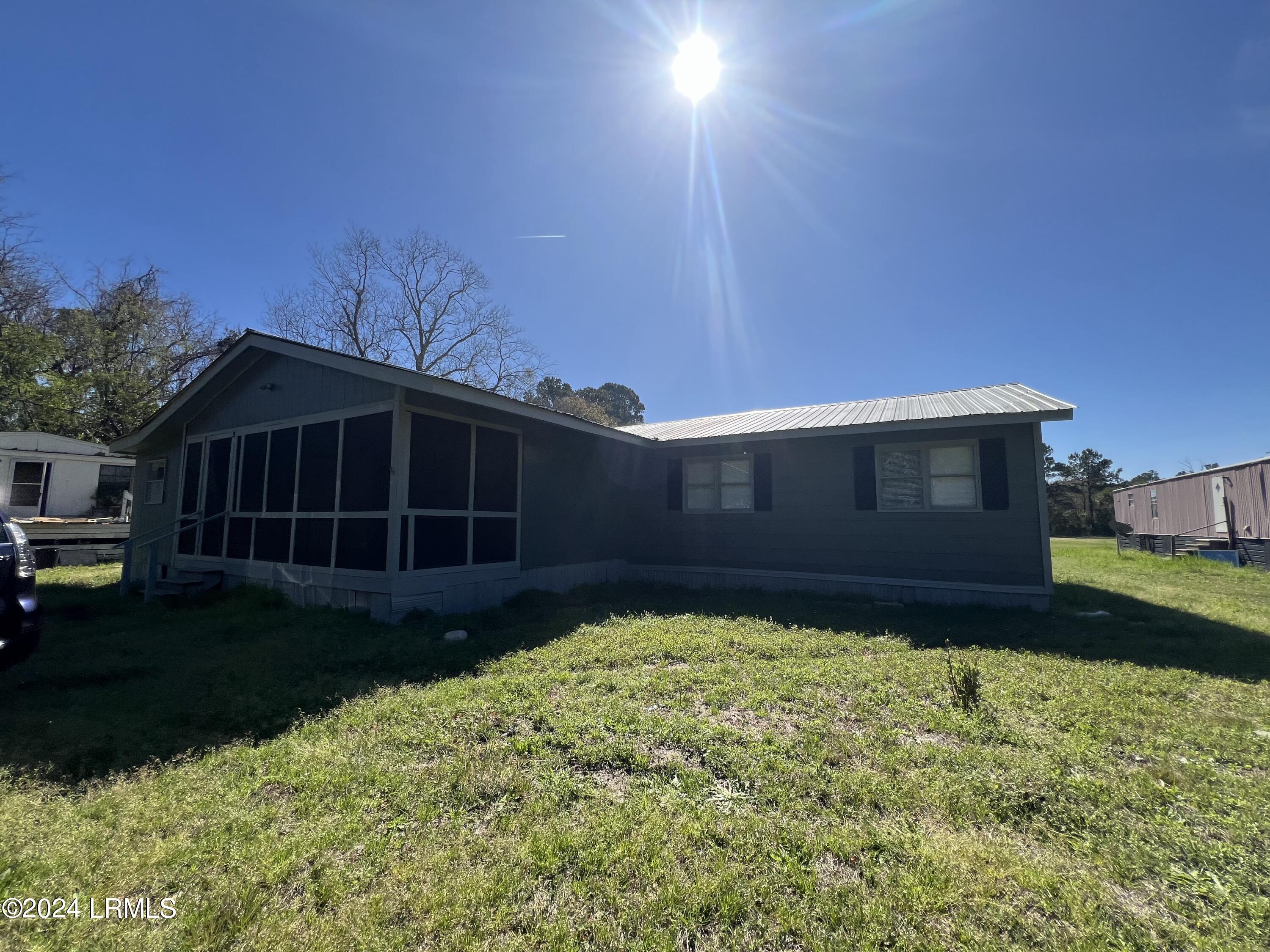426 Eddings Point Road St. Helena Island, SC 29920 - Photo 1 of 1 Front Exterior