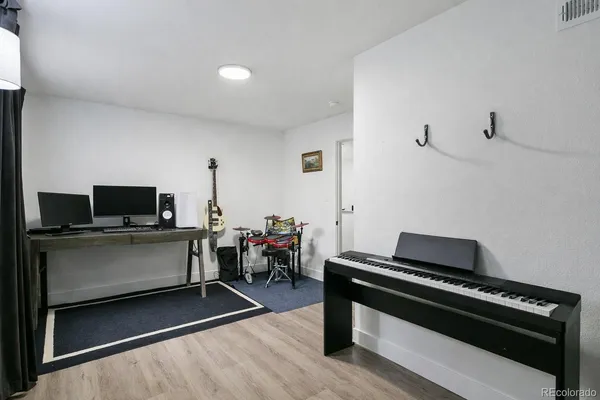 a room with furniture and a flat screen tv