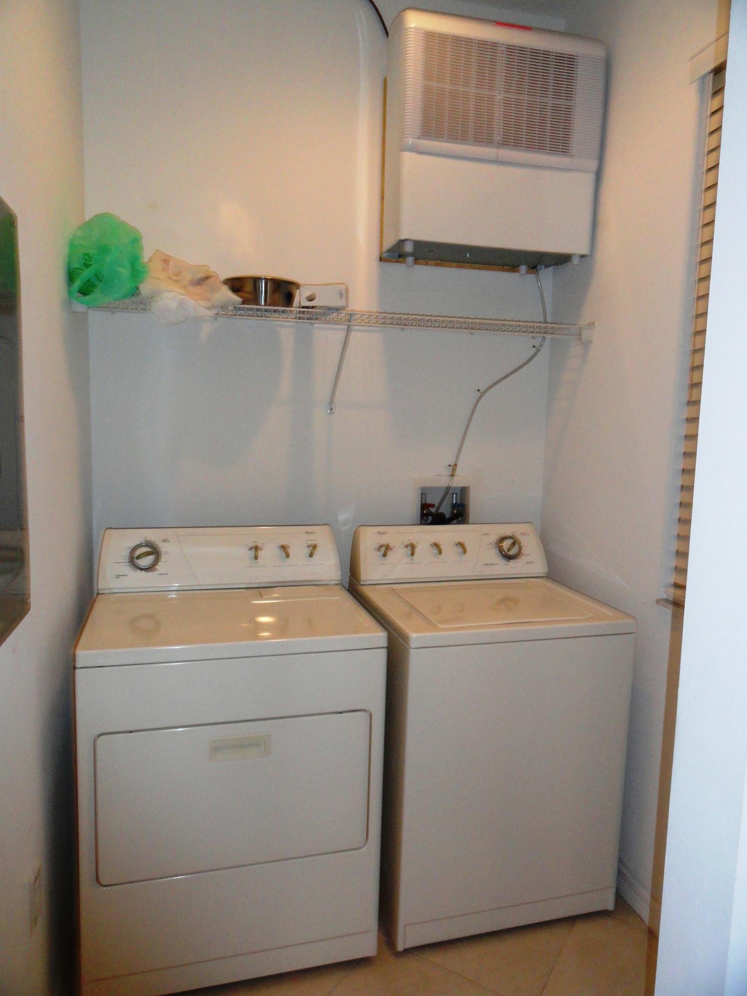 1605 Renaissance Commons Boulevard, Unit 121 Boynton Beach, FL 33426 - Photo 11 of 18 Laundry Rm