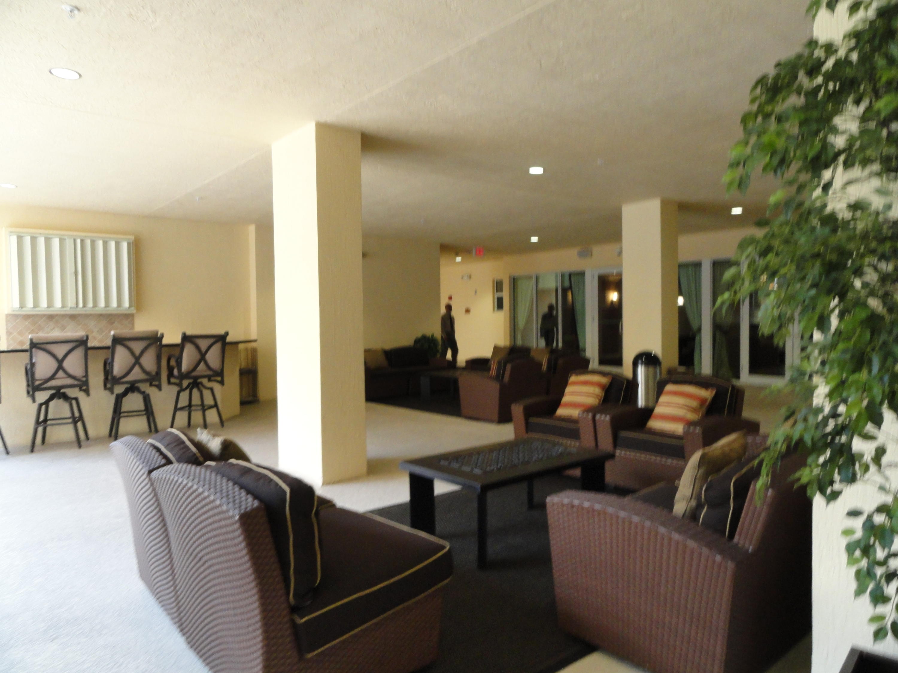 1605 Renaissance Commons Boulevard, Unit 121 Boynton Beach, FL 33426 - Photo 17 of 18 Outdoor Lobby