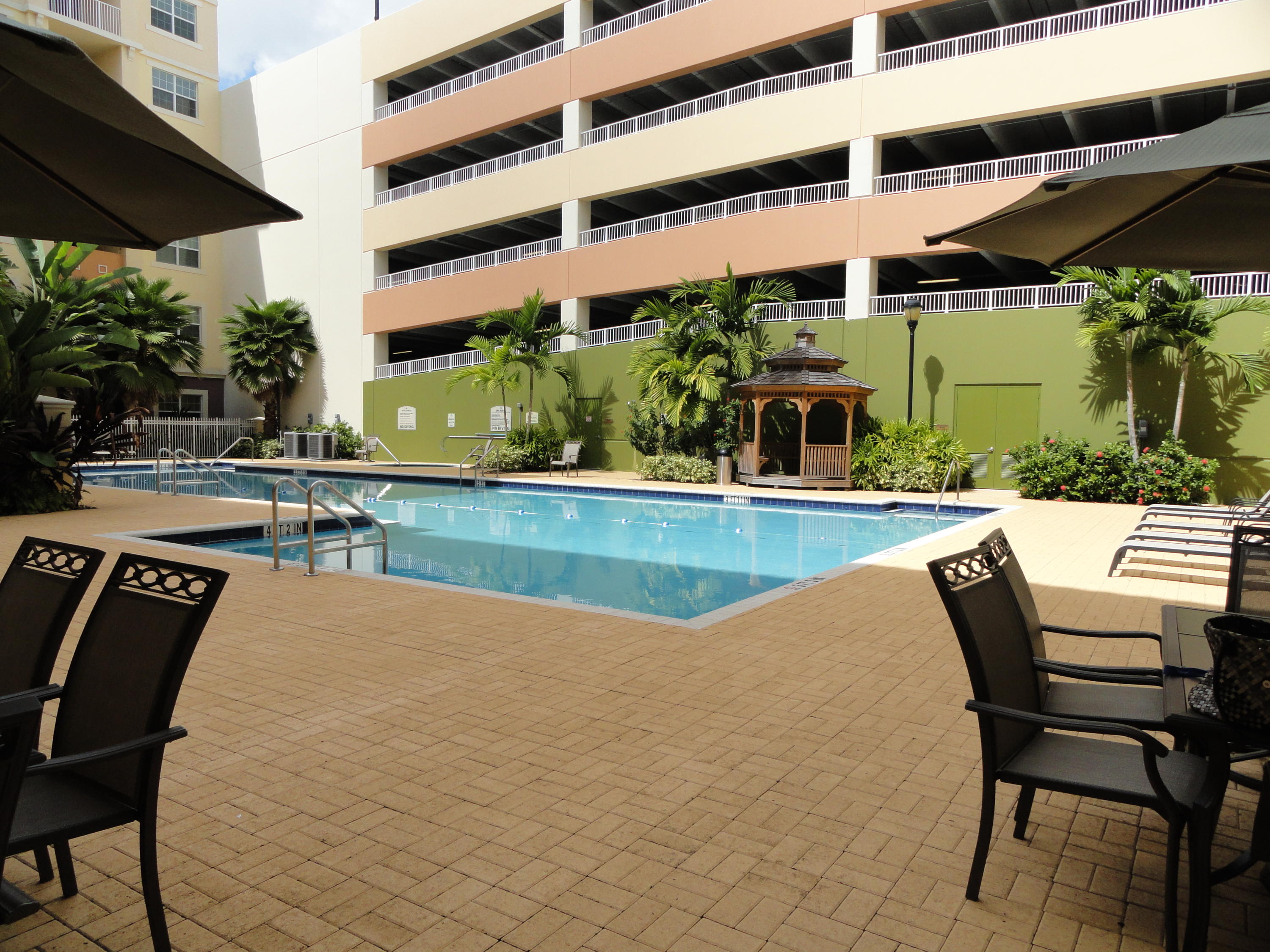 1605 Renaissance Commons Boulevard, Unit 121 Boynton Beach, FL 33426 - Photo 18 of 18 Resort Style Pool