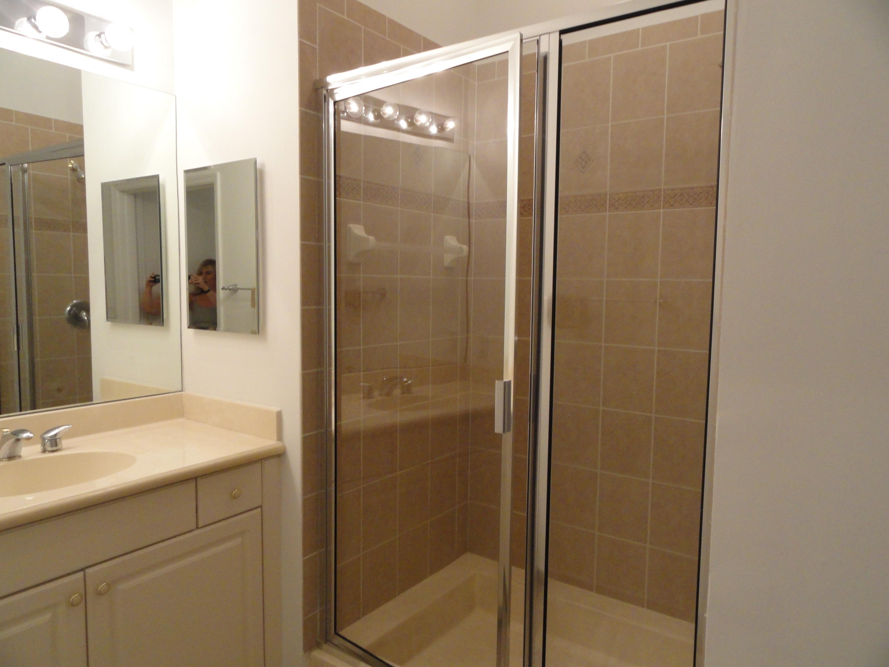 1605 Renaissance Commons Boulevard, Unit 121 Boynton Beach, FL 33426 - Photo 8 of 18 Master Bathroom