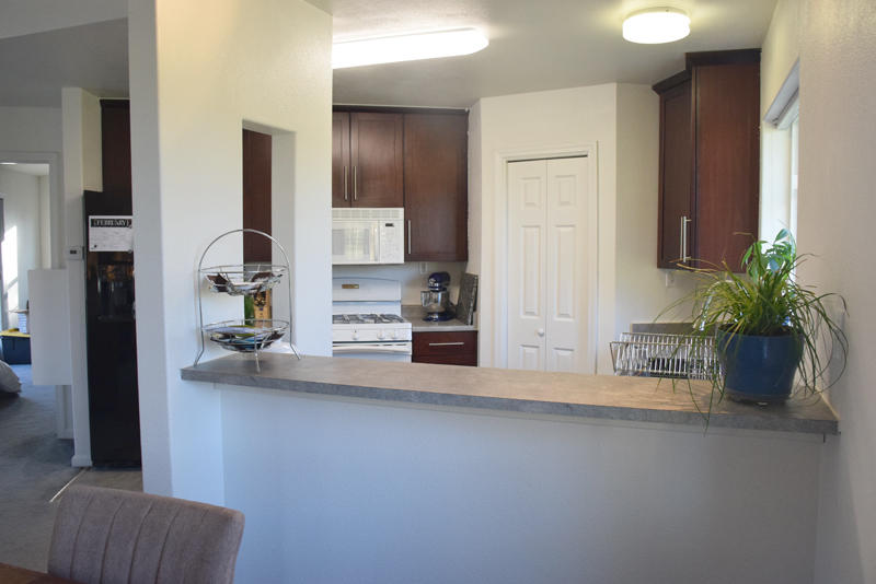 28899 Whitmore Road Whitmore, CA 96096 - Photo 13 of 43 Bfst bar into kitchen