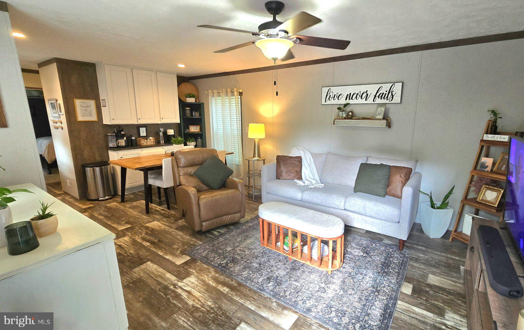 7810 Clark Road, Unit A49 Jessup, MD 20794 - Photo 3 of 26 Cozy living space with modern charm.