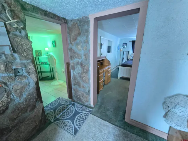 a view of living room with furniture and a window