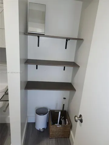 a bathroom with a toilet and a sink