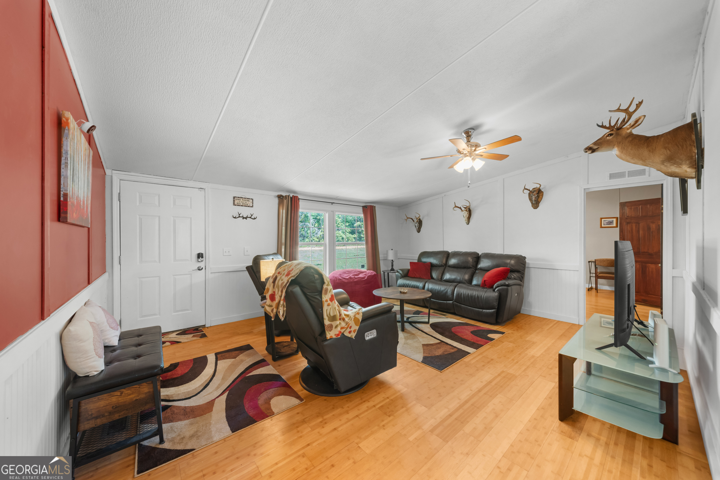 3347 Dickey Road Millen, GA 30442 - Photo 14 of 31 a living room with furniture and wooden floor