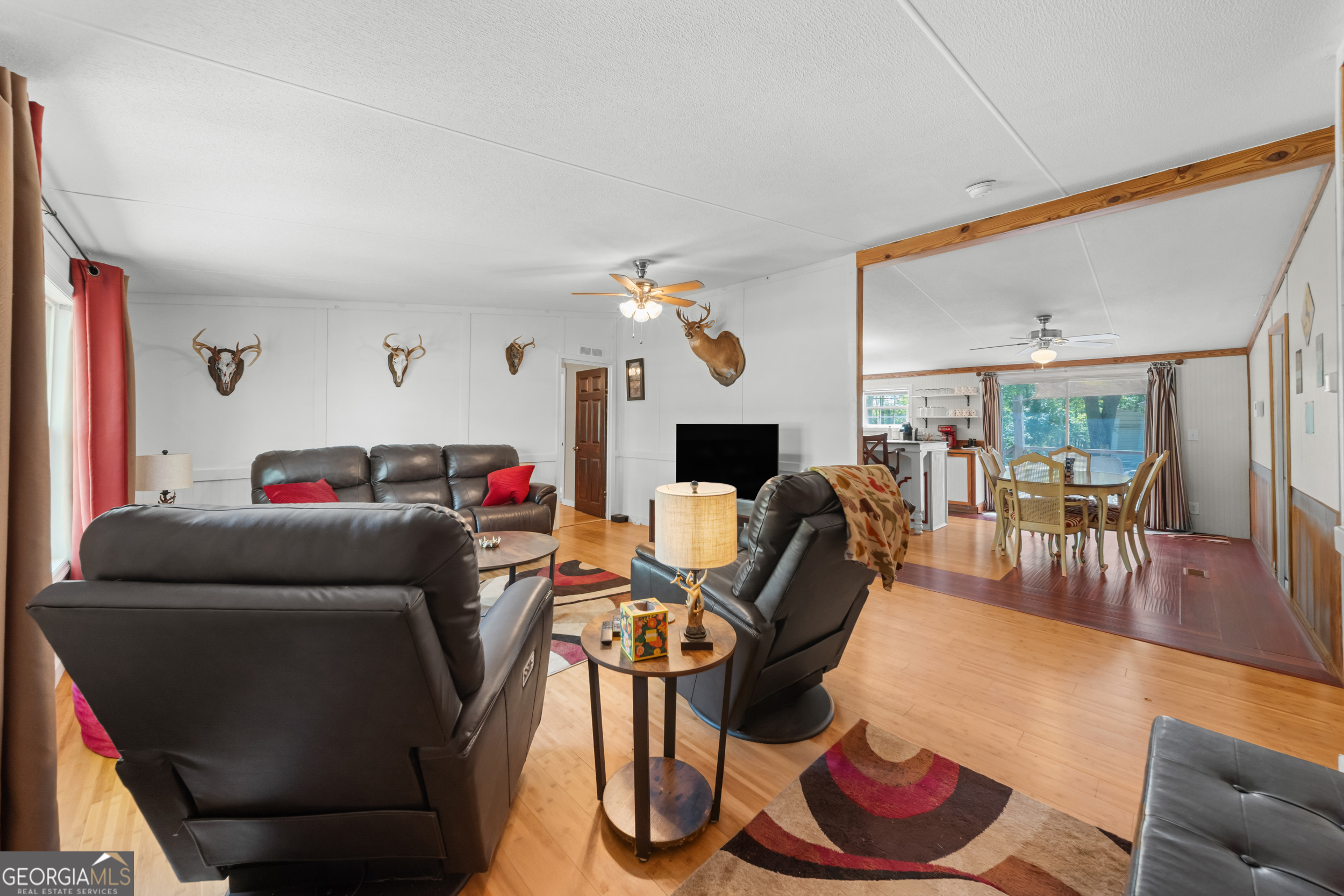 3347 Dickey Road Millen, GA 30442 - Photo 15 of 31 a living room with furniture and wooden floor