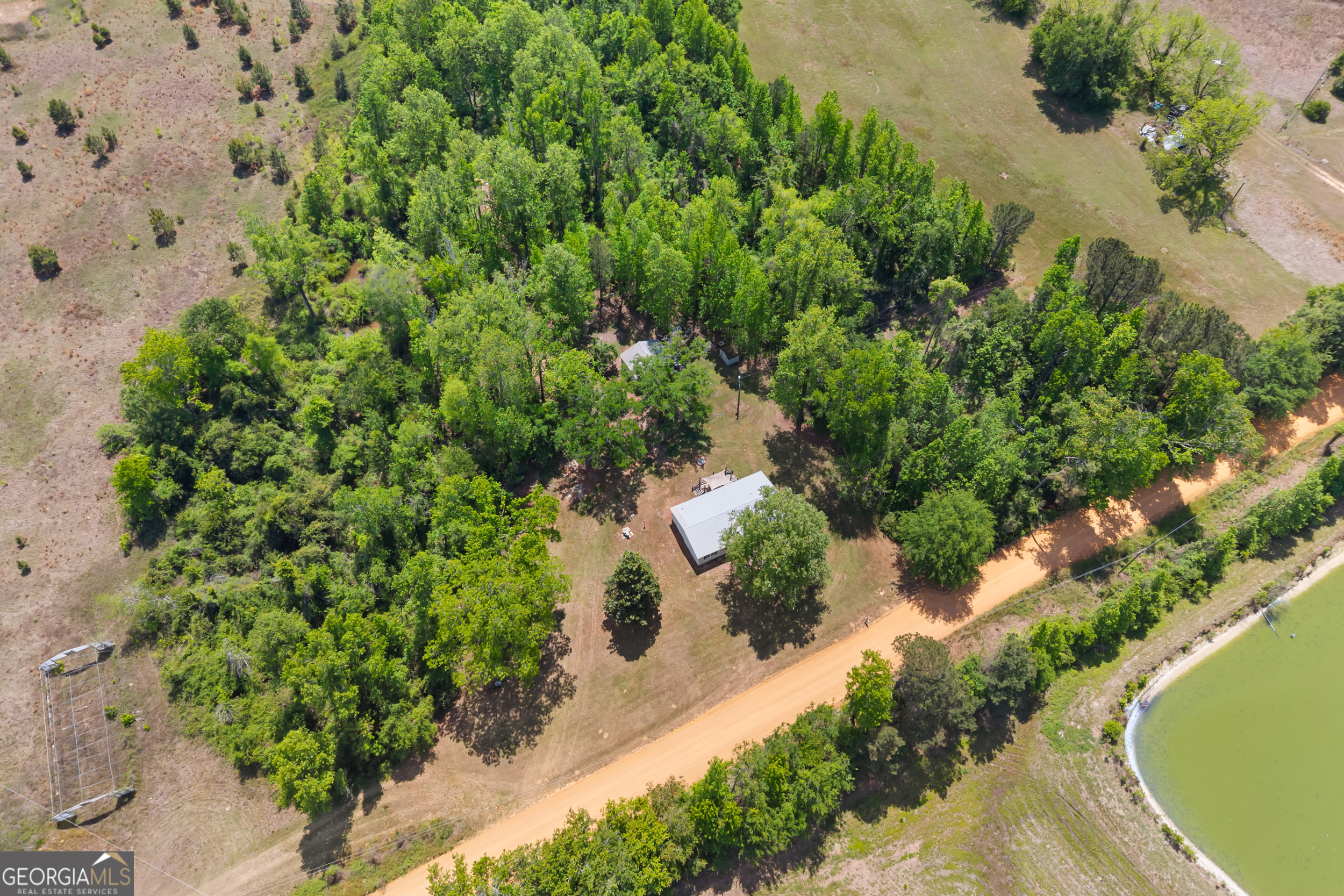 3347 Dickey Road Millen, GA 30442 - Photo 27 of 31 an aerial view of a house with a yard and lake view