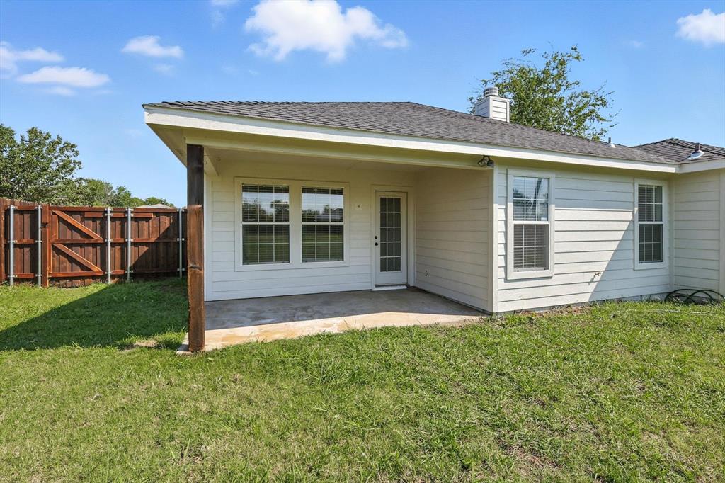 621 Torero Trail Oak Point, TX 75068 - Photo 30 of 34 a view of house with backyard