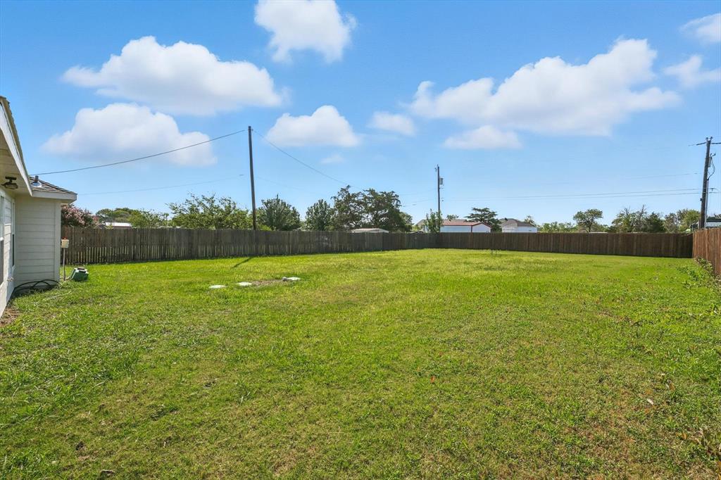 621 Torero Trail Oak Point, TX 75068 - Photo 31 of 34 a view of a golf course with a lake