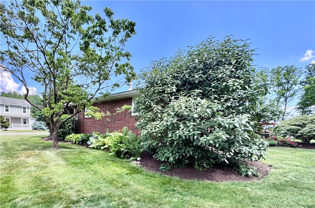 5334 Egypt Road Laurys Station, PA 18059 - Photo 44 of 55 Well-tended landscaping and mature trees complement this brick residence with a neatly manicured lawn.