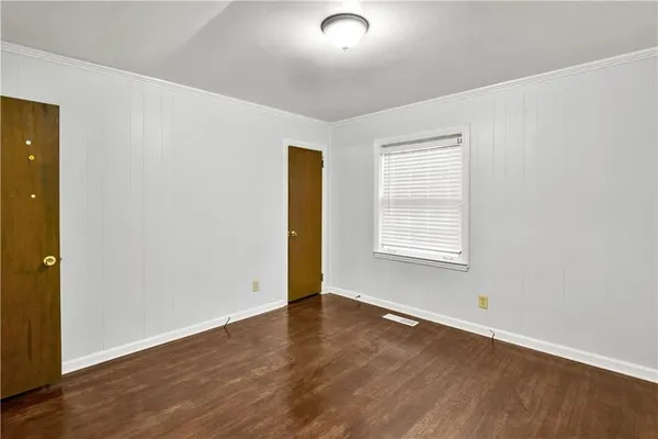 a bathroom with a sink a mirror and a shower