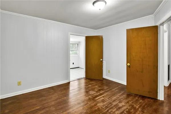 a view of a room with a large window