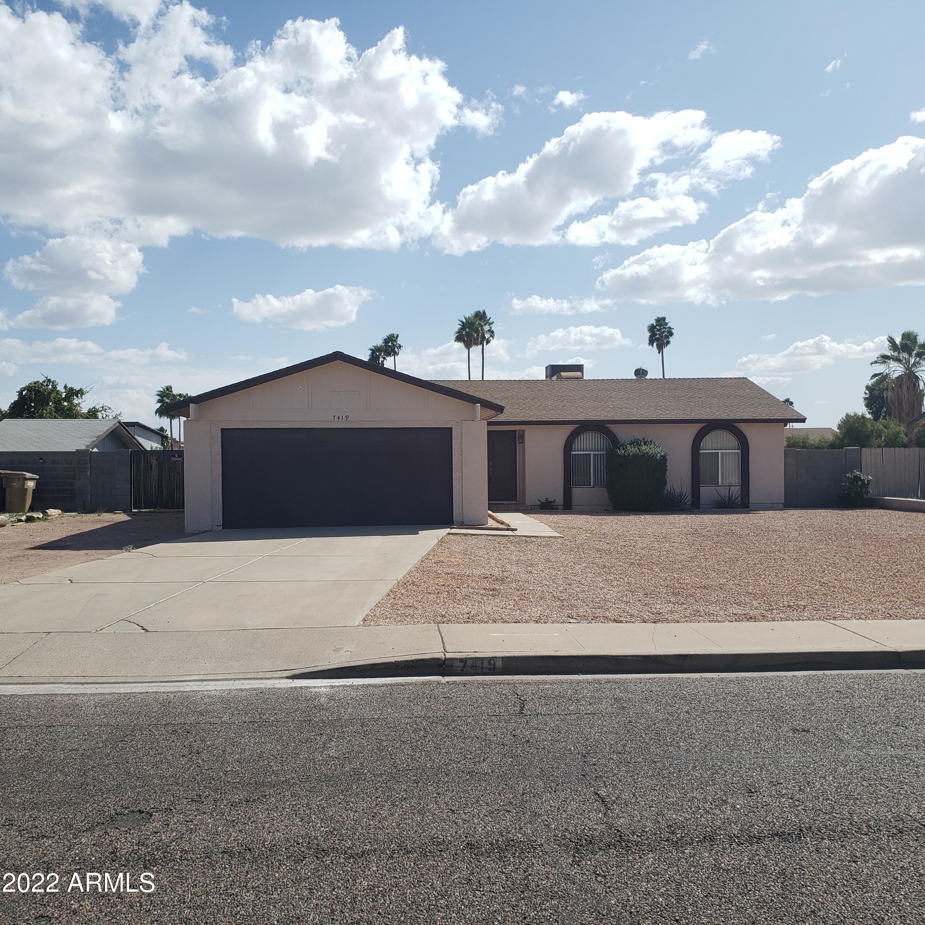 7419 West Hatcher Road Peoria, AZ 85345 - Photo 1 of 12 HATCHER FRONT 1