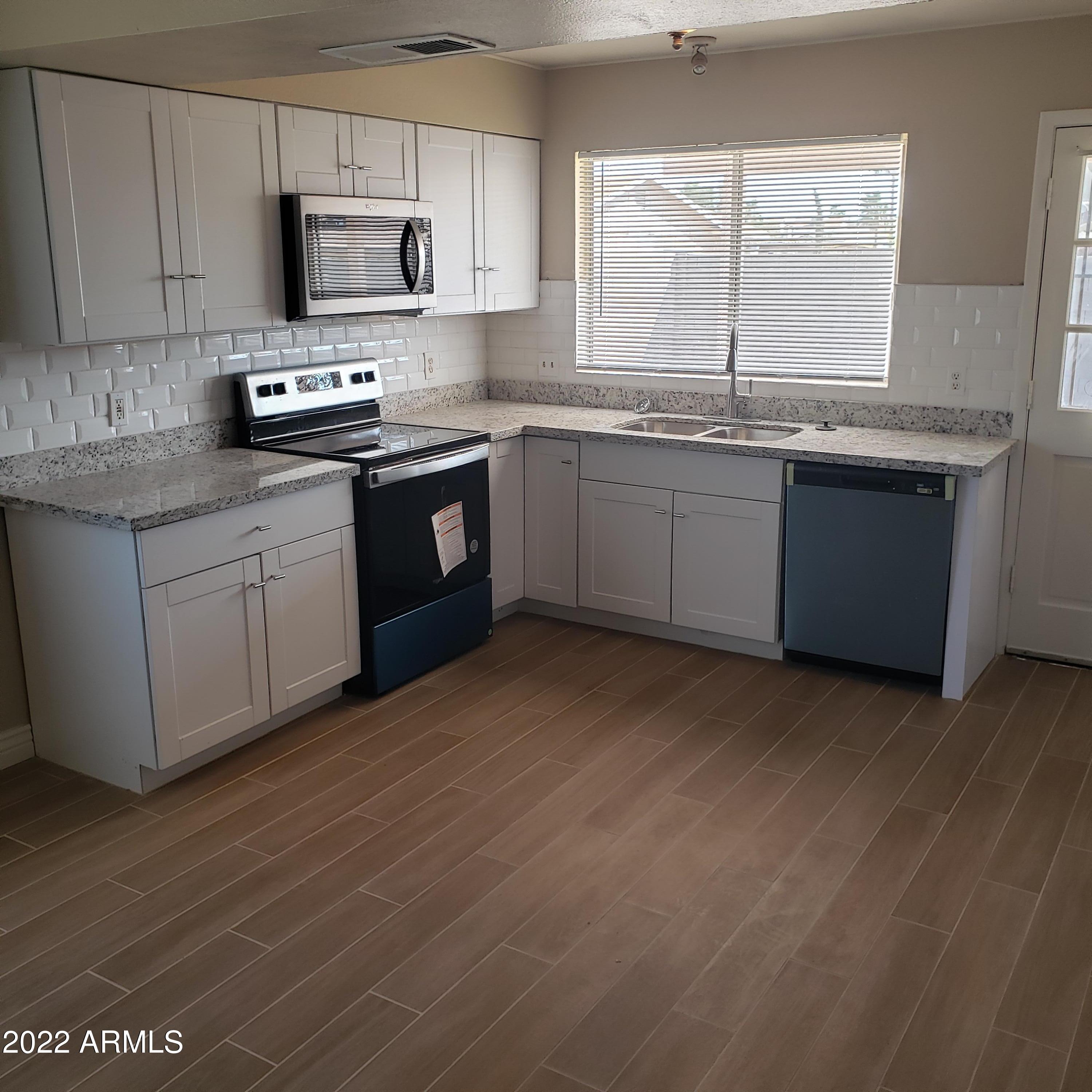 7419 West Hatcher Road Peoria, AZ 85345 - Photo 3 of 12 HATCHER KITCHEN 1