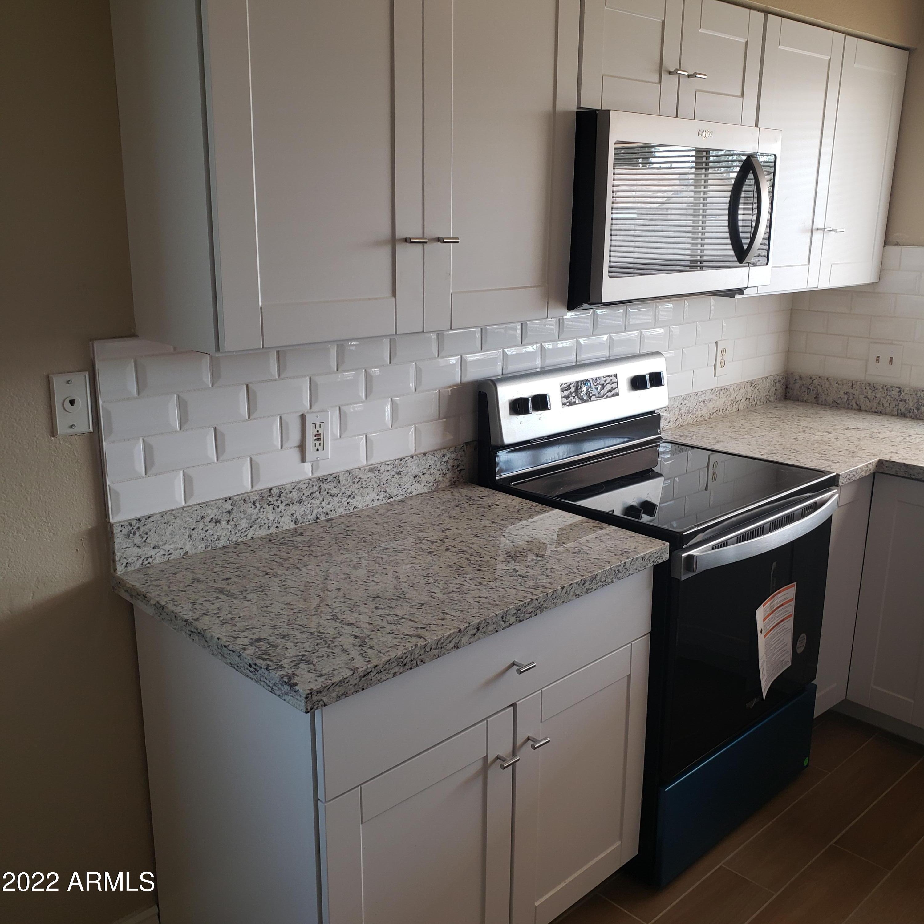 7419 West Hatcher Road Peoria, AZ 85345 - Photo 4 of 12 HATCHER KITCHEN 2