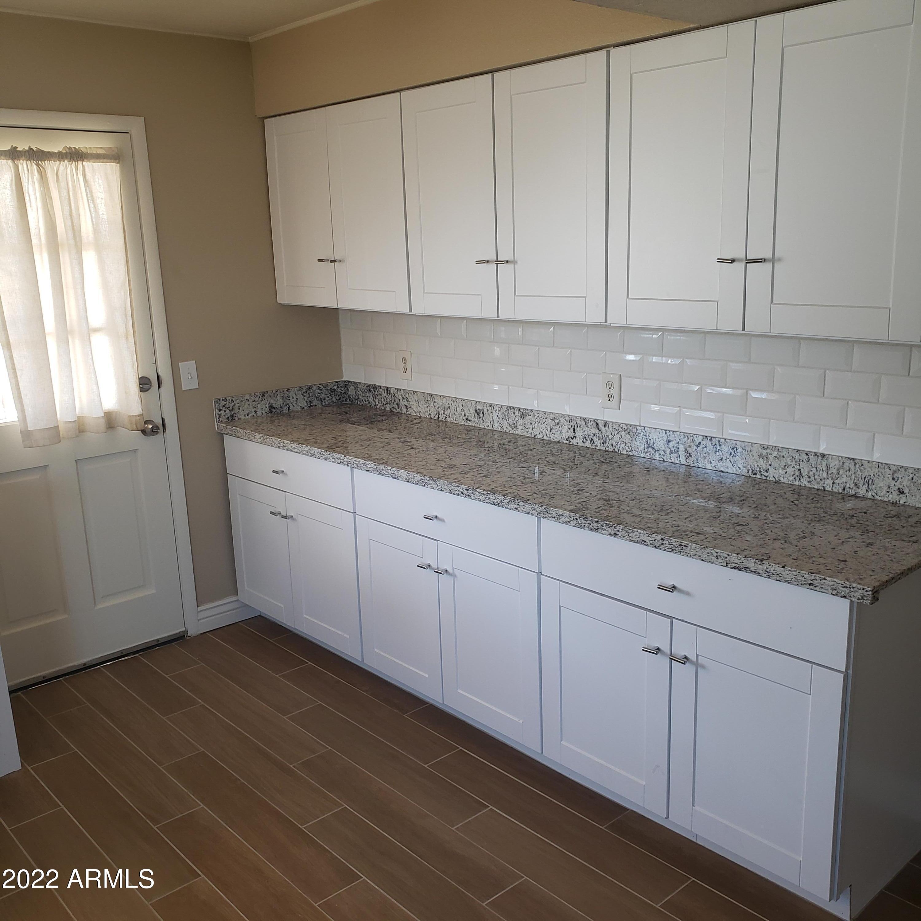 7419 West Hatcher Road Peoria, AZ 85345 - Photo 5 of 12 HATCHER KITCHEN 3