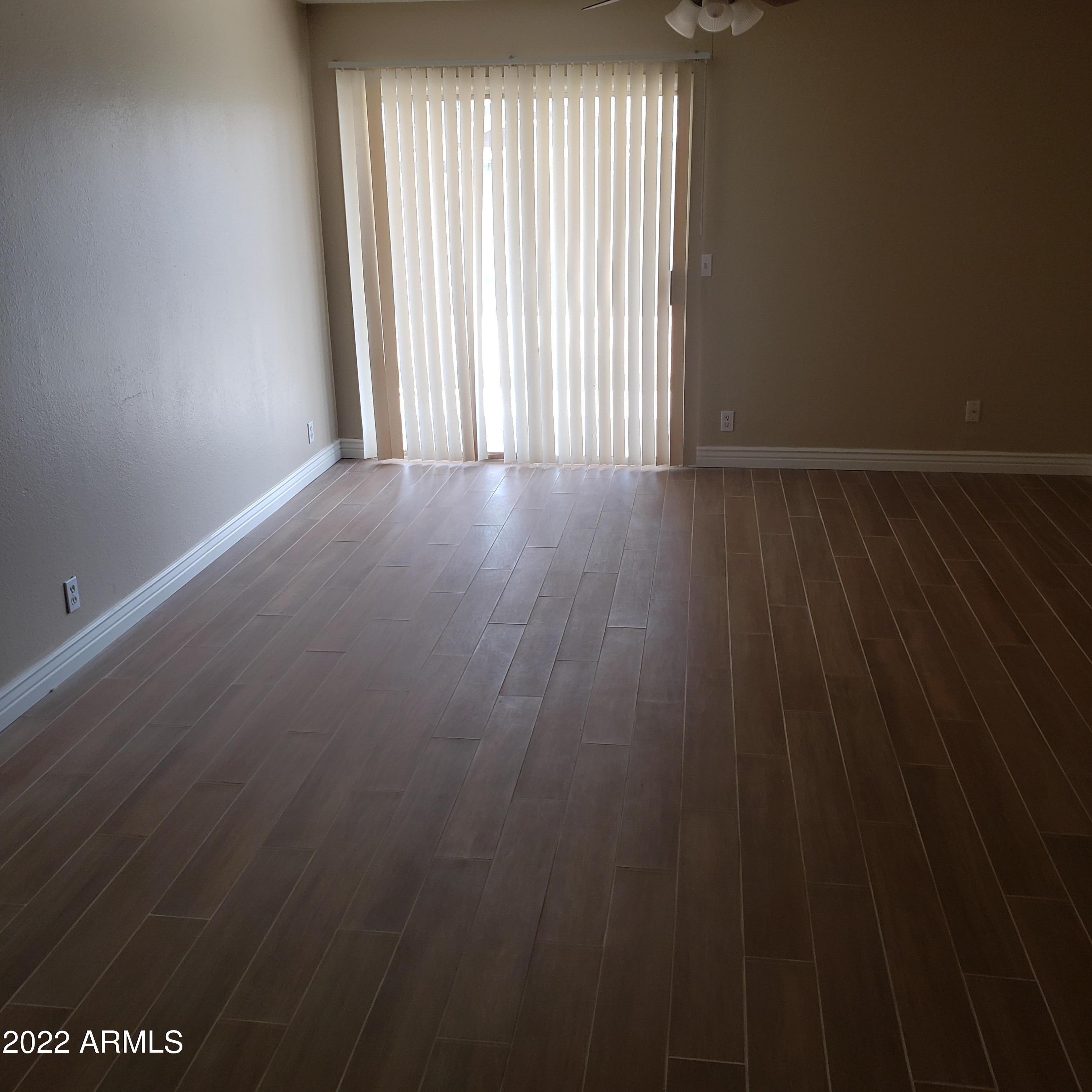 7419 West Hatcher Road Peoria, AZ 85345 - Photo 8 of 12 HATCHER 2ND LIVING ROOM