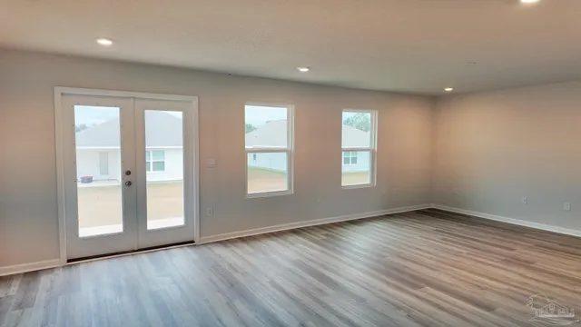 a view of a bathroom from the hallway