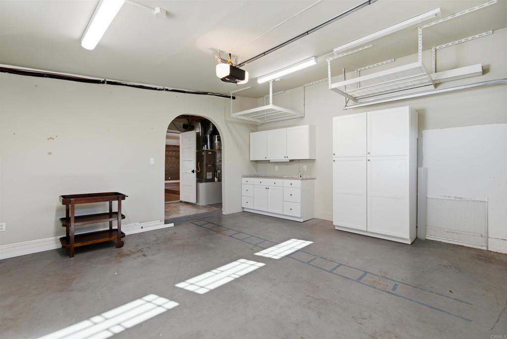 1693 Downing Street Simi Valley, CA 93065 - Photo 36 of 39 Garage leading into laundry area and garage door to home.