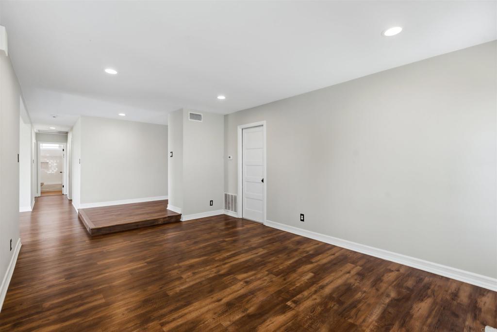 1693 Downing Street Simi Valley, CA 93065 - Photo 6 of 39 Looking from dining area/ fireplace back toward front door. Hallway leads to all bedrooms and baths.